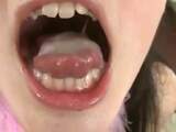 Cum in a Japanese girl's mouth